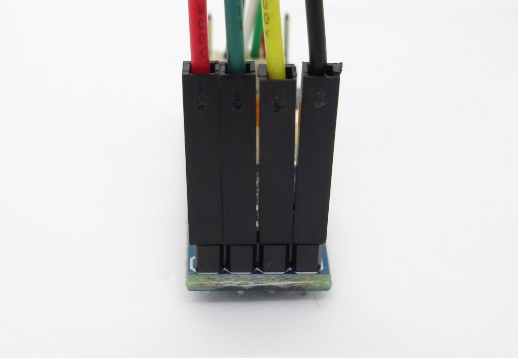 Jumper wire connections on the <em>Level Converter</em> board.